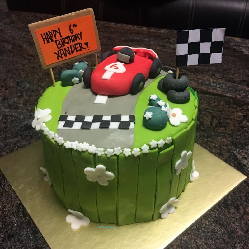 Customised race car birthday cake